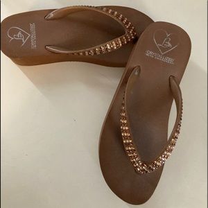 Lady Lanell’s sandals bejeweled with Swarovski crystals.